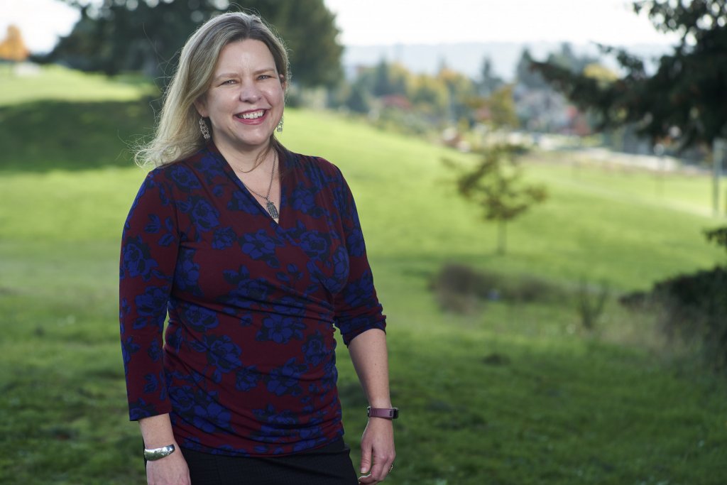 Allison Geiselbrecht standing in a grassy field