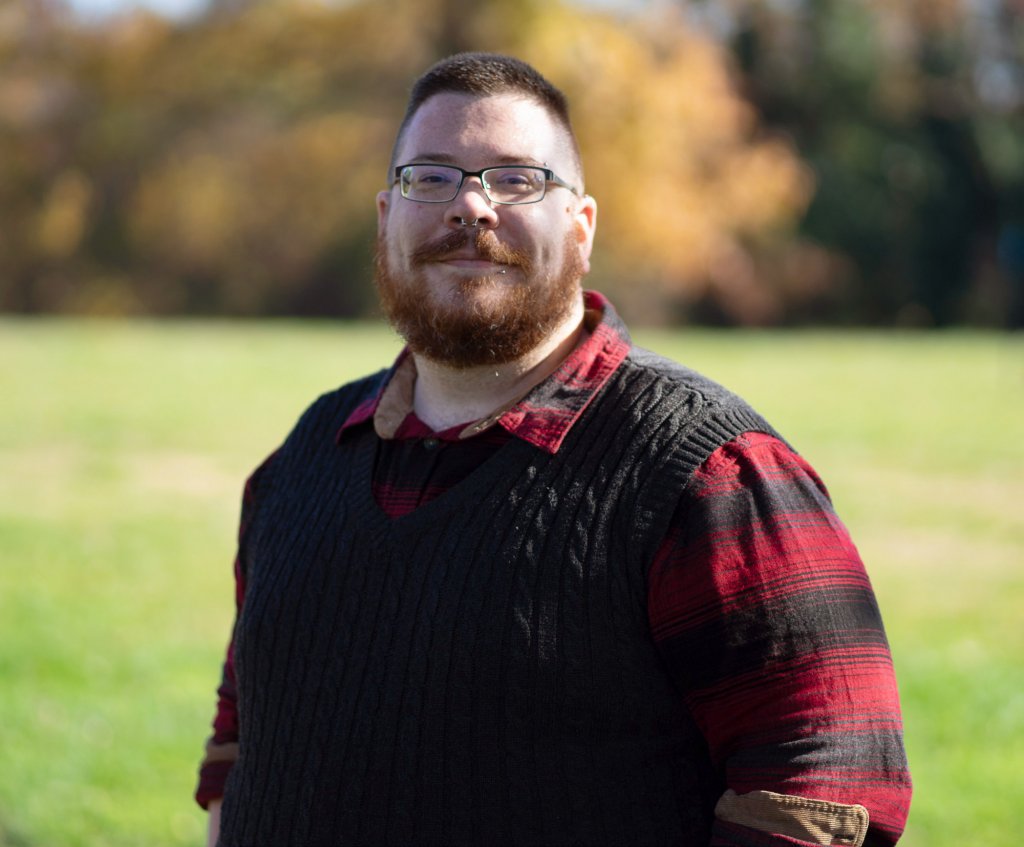 Kenneth Moore standing in an open field
